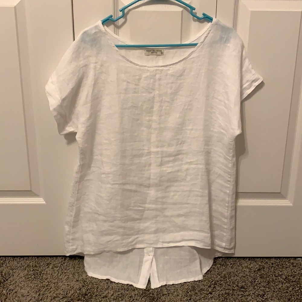 Never worn!! LOVE THIS SHIRT just doesn’t fit right.